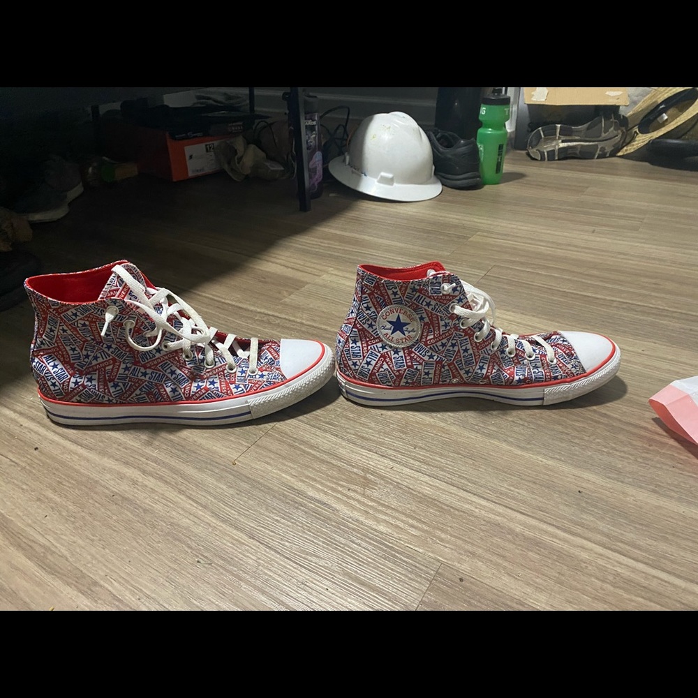Red and blue logo chuck taylors